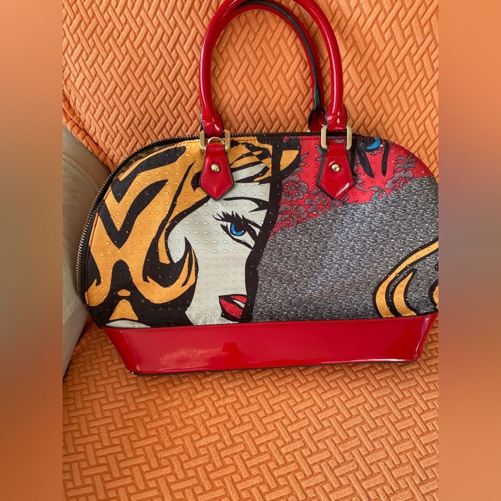 David Jones Paris woman’s face design red shoulder bag